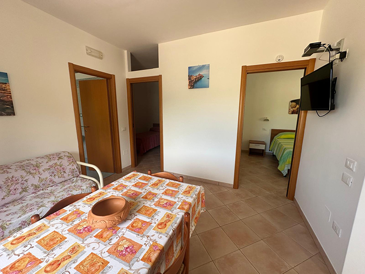soggiorno ingresso camere trilo1